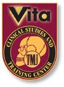 The image shows a logo for Vita Clinical Studies   Training Center with text indicating  VITA  at the top, followed by  Clinical Studies   Training Center,  and below that,  TMJ Training Center.